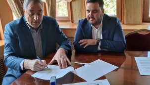 BAŞKAN AKBUĞA İMZALADI