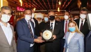 MHP İLÇE BAŞKANI AKÇA'DAN TATAR'A PLAKET