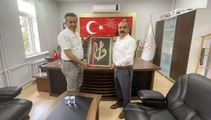 İŞCAN'DAN TABLO TAKDİMİ 