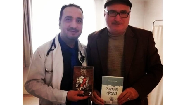 KÖKER'DEN DR.ÇETİN DUMAN'A KİTAP TAKDİMİ 