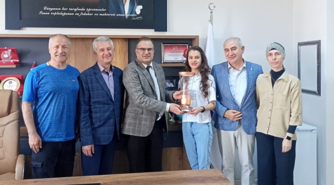 DÜNYA ÜÇÜNCÜSÜ SPORCUDAN TOPLAOĞLU'NA ZİYARET 