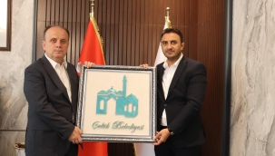 BAŞKAN MEŞE'DEN VEKİL BAYKAN'A TABLO TAKDİMİ 