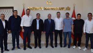 TİCARET ODASI VE TİCARET BORSASI HEYETİNDEN KAYMAKAM ÖZEL'E ZİYARET 