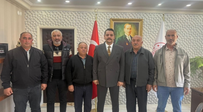 MUHTARLARDAN KAYMAKAM TAŞAVLI'YA HAYIRLI OLSUN ZİYARETİ 