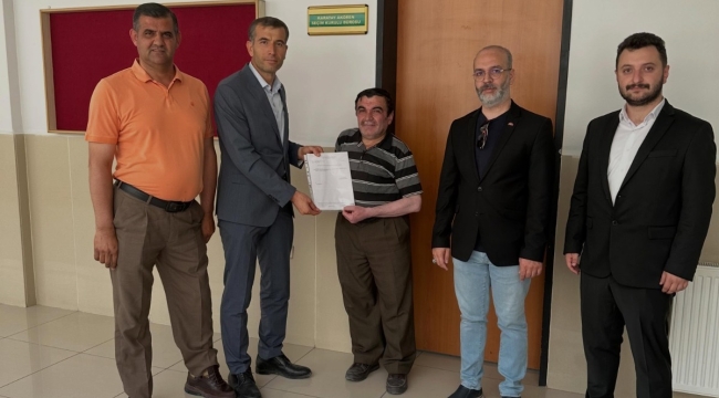 MHP Karatay İlçe Başkanı Muammer Özcan Mazbatasını Teslim Aldı 
